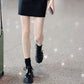 Stylish High-Heel Boots: A Woman With a Platform and a Single Shoe | Enigma Paris.