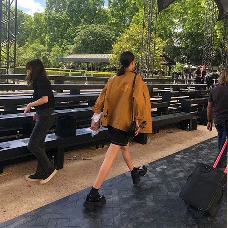 Stylish High-Heel Boots: A Woman With a Platform and a Single Shoe | Enigma Paris.